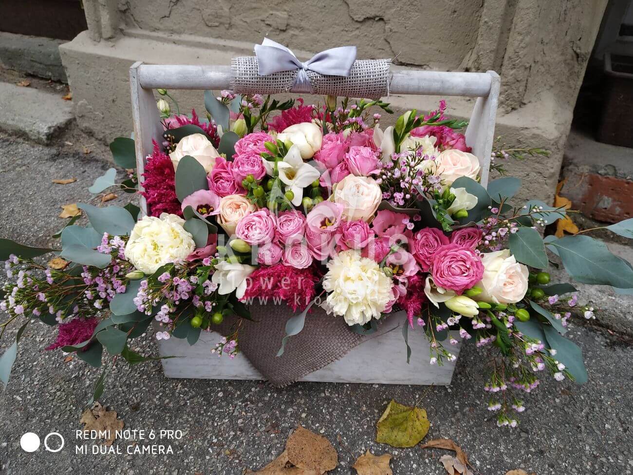 Deliver flowers to Ventspils (boxpink rosesfreesiaalstroemeriagum treehypericumwaxflowerpeonies)